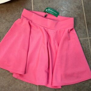 Urban coco never worn medium. Tags on